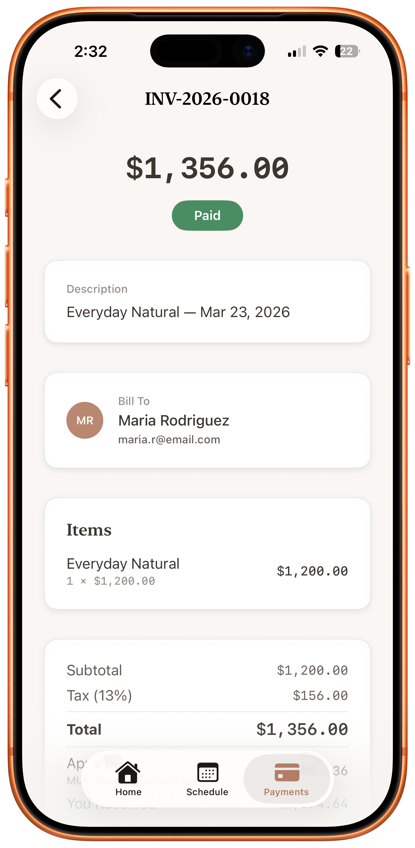 Invoice detail with Paid status, line items, tax, and total